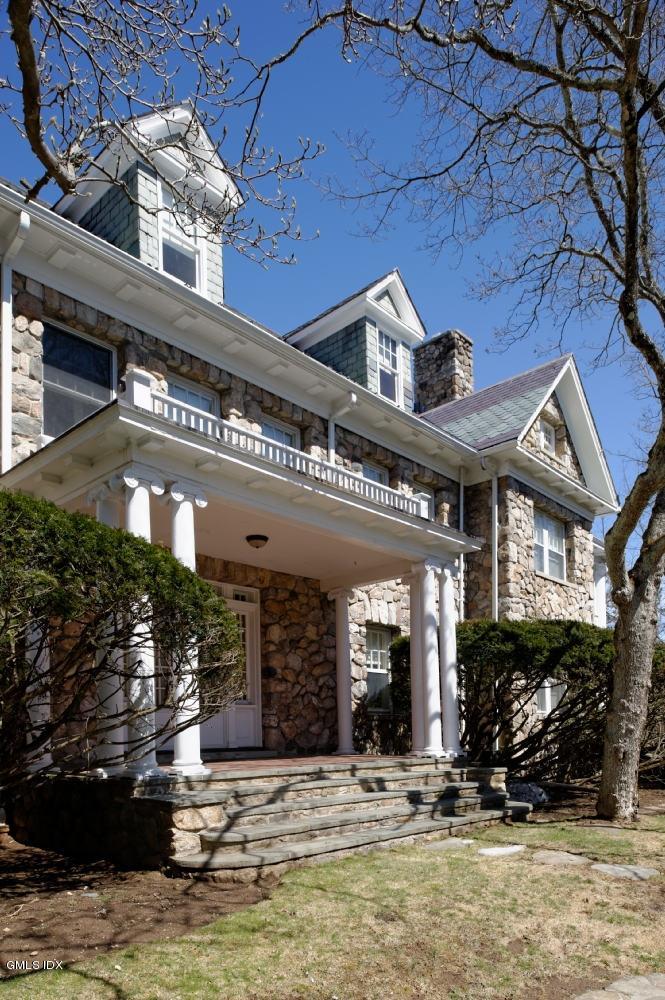 105 Dingletown Road Greenwich, CT 06830 - Photo 34 of 65 a view of a building with a patio