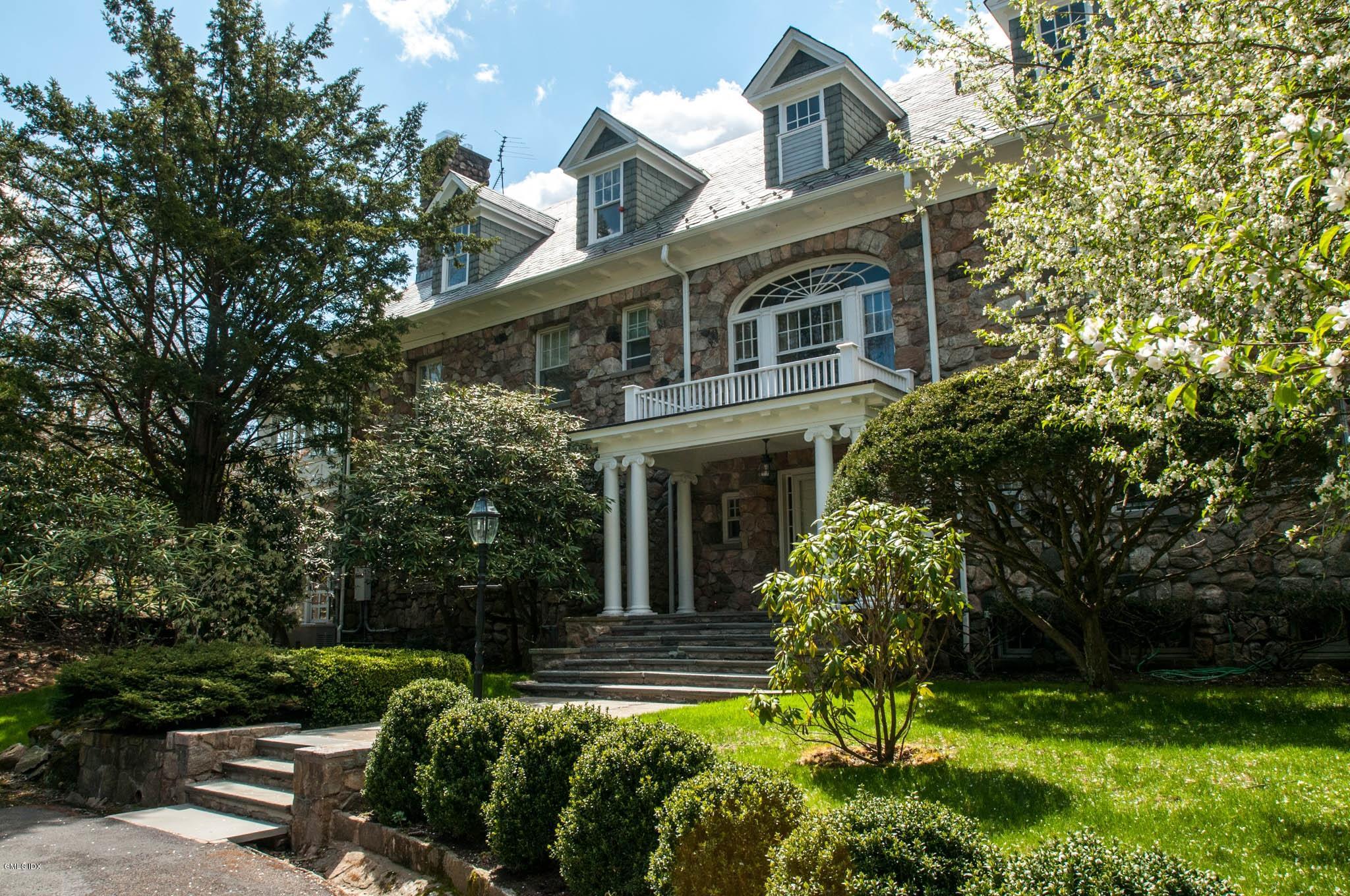 105 Dingletown Road Greenwich, CT 06830 - Photo 38 of 65 a front view of house with yard and green space