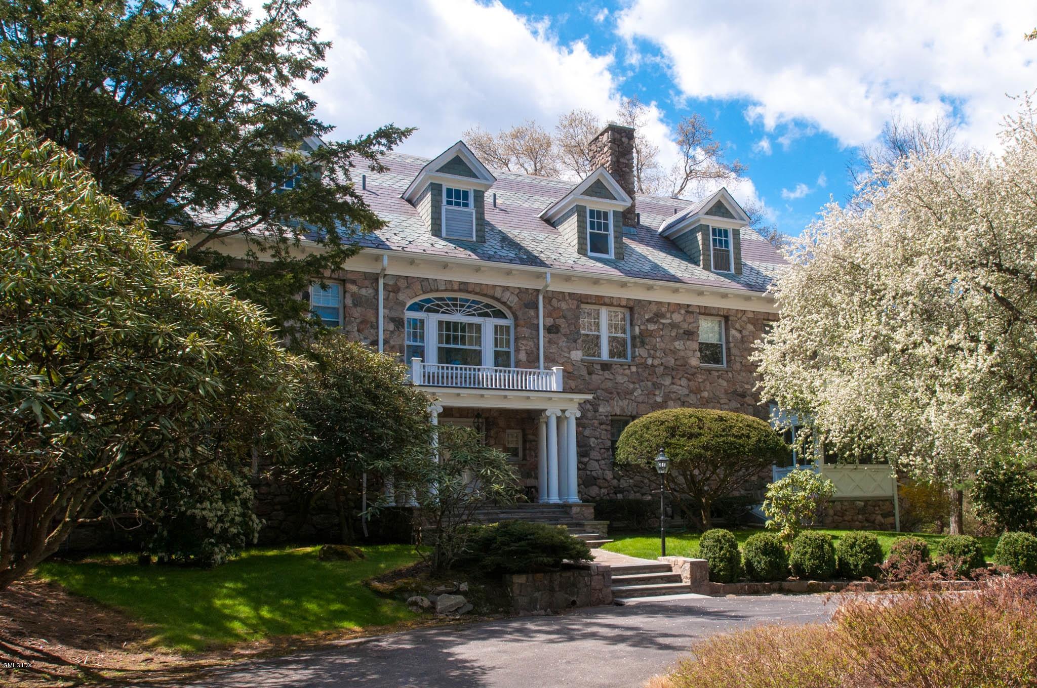 105 Dingletown Road Greenwich, CT 06830 - Photo 39 of 65 a front view of a house with yard and green space