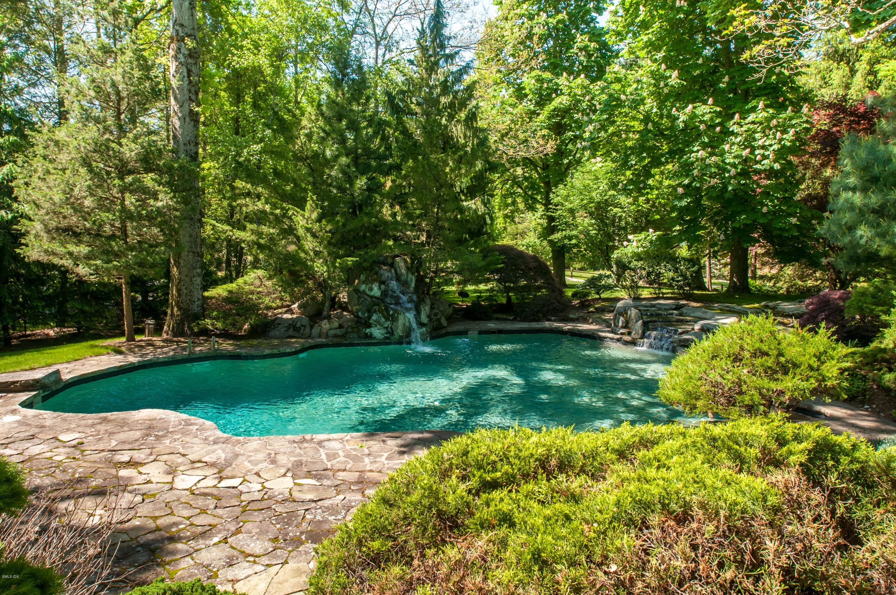 105 Dingletown Road Greenwich, CT 06830 - Photo 46 of 65 a view of a park with large trees