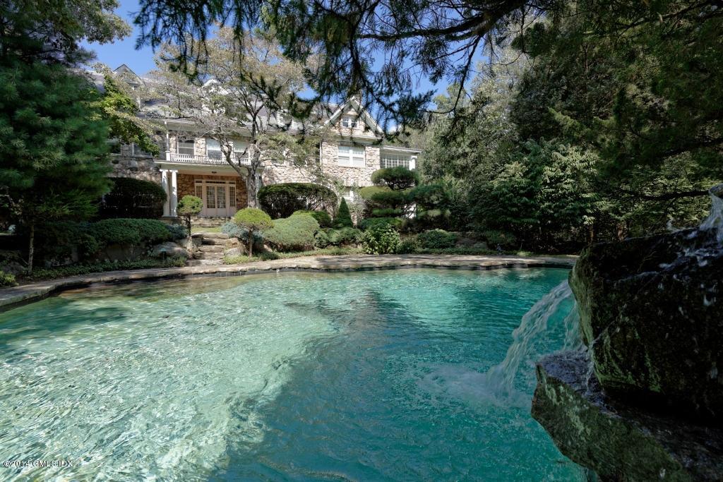 105 Dingletown Road Greenwich, CT 06830 - Photo 55 of 65 a backyard of a house with lots of green space