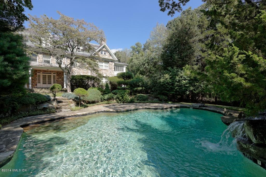105 Dingletown Road Greenwich, CT 06830 - Photo 57 of 65 a view of backyard with outdoor seating and green space