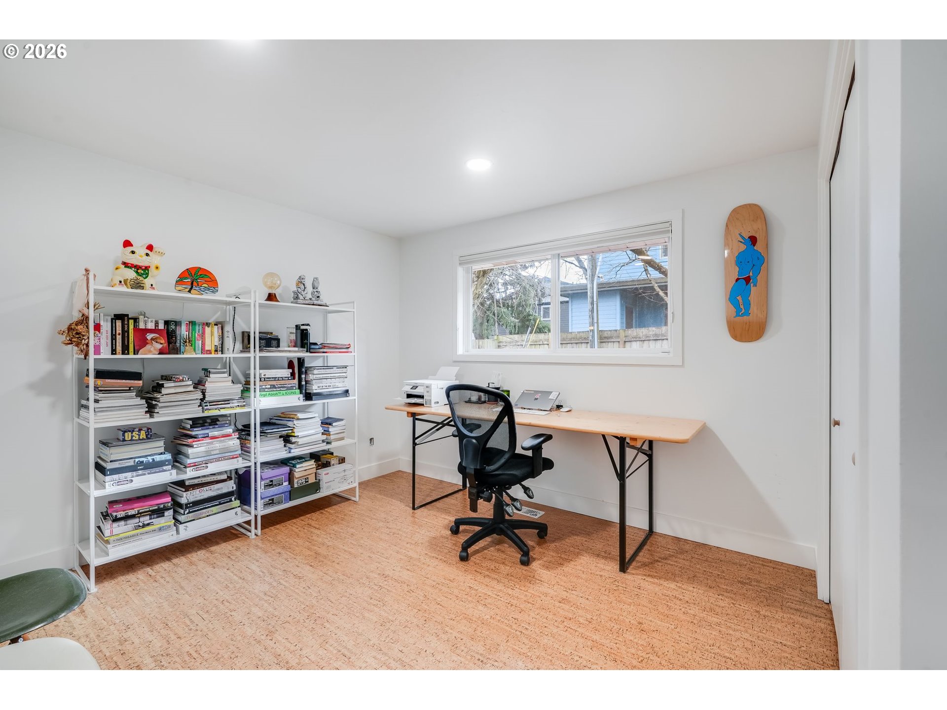 5214 Northeast Jessup Street Portland, OR 97218 - Photo 23 of 28 a view of a workspace with furniture
