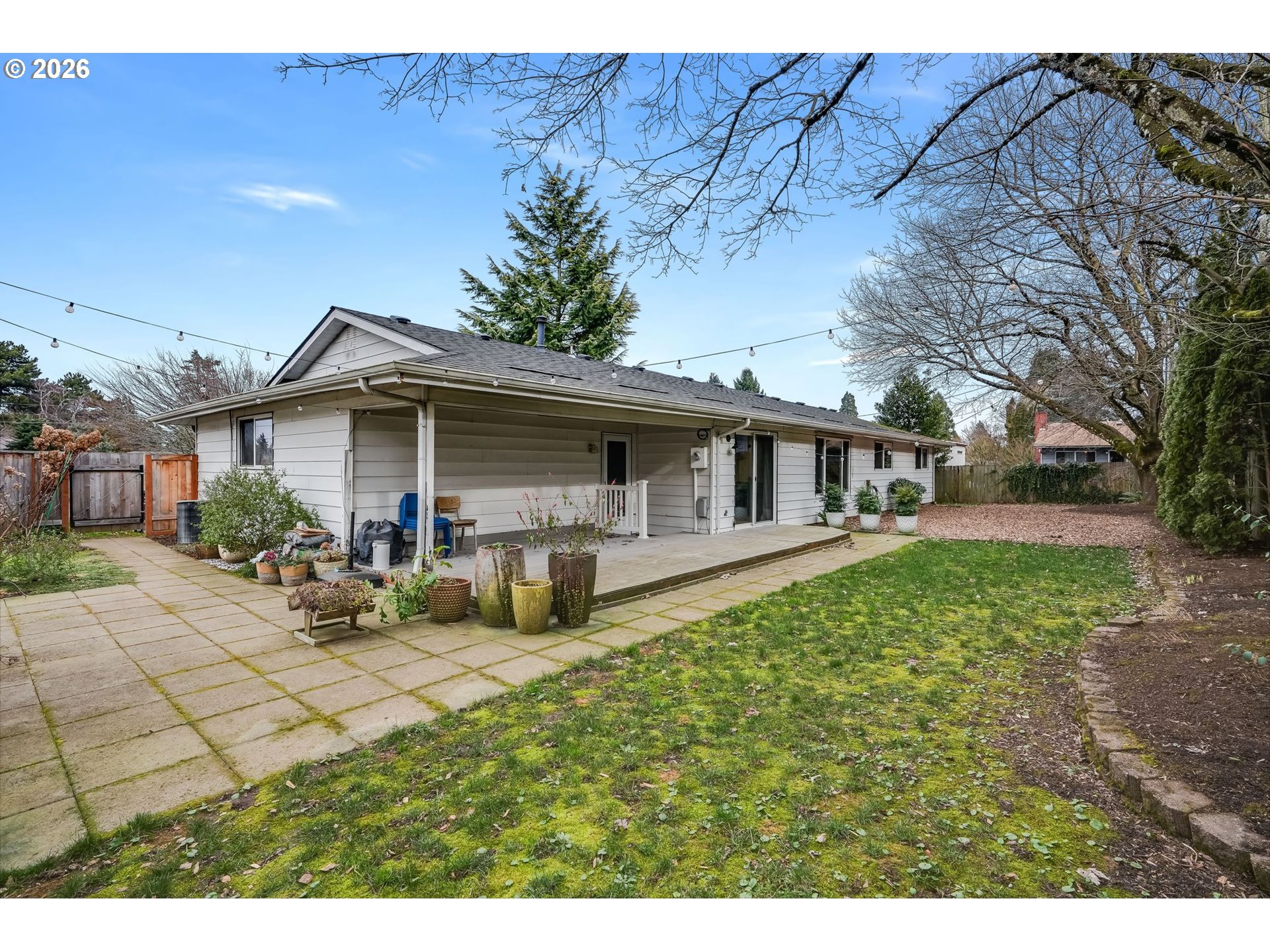 5214 Northeast Jessup Street Portland, OR 97218 - Photo 26 of 28 a view of a house with backyard and sitting area