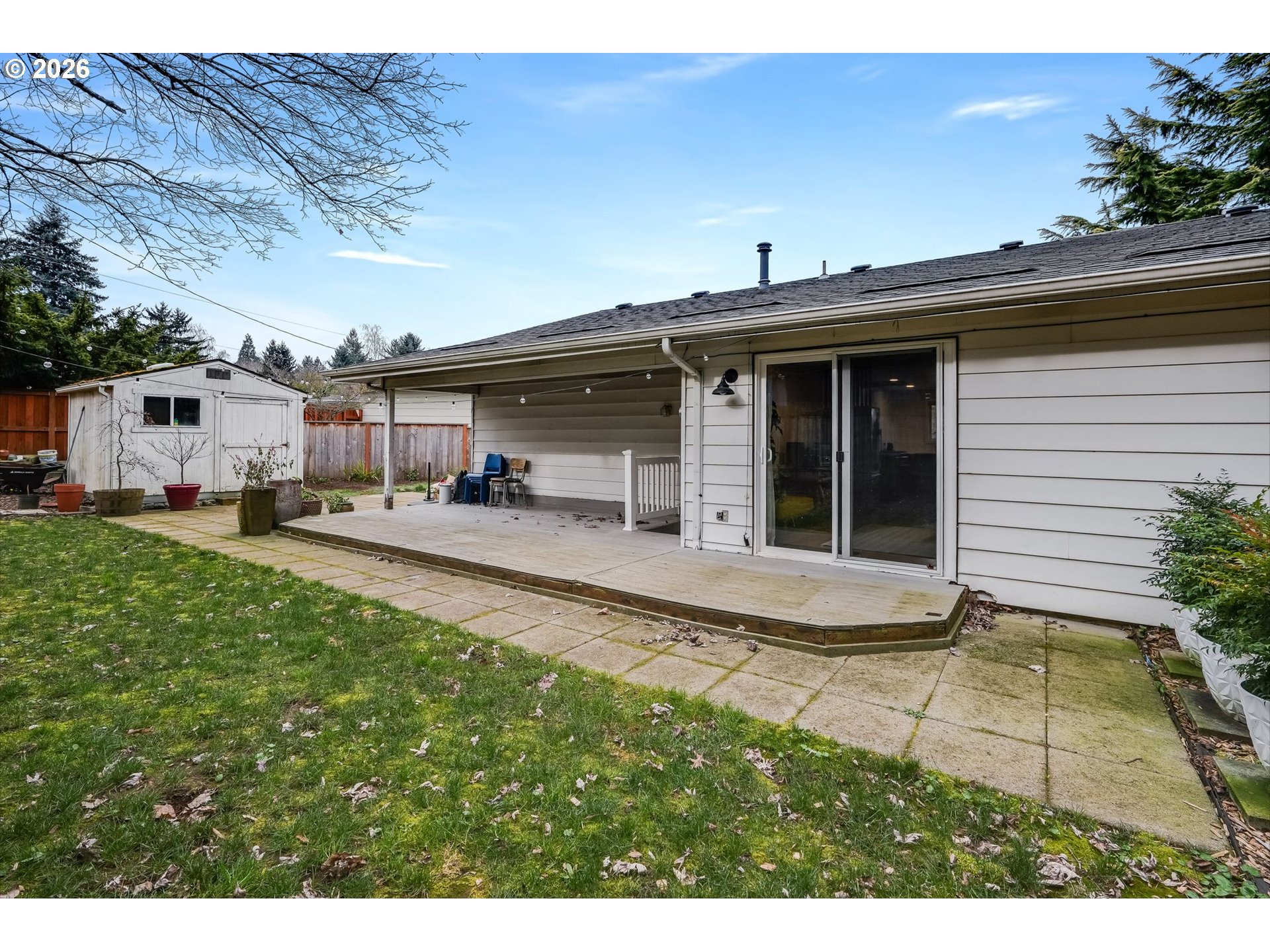 5214 Northeast Jessup Street Portland, OR 97218 - Photo 27 of 28 a view of a house with backyard and porch
