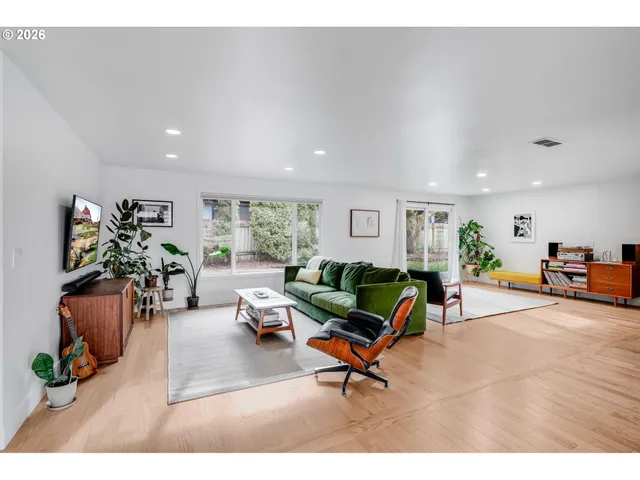 a living room with furniture and a couch