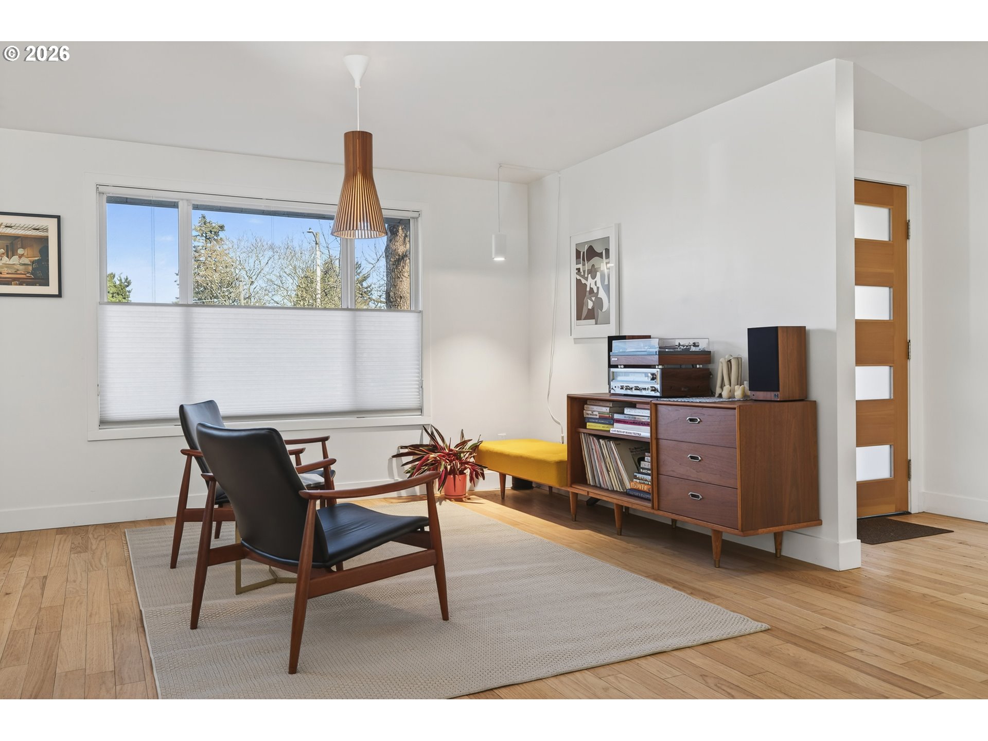 5214 Northeast Jessup Street Portland, OR 97218 - Photo 36 of 36 a workspace with furniture wooden floor and a window