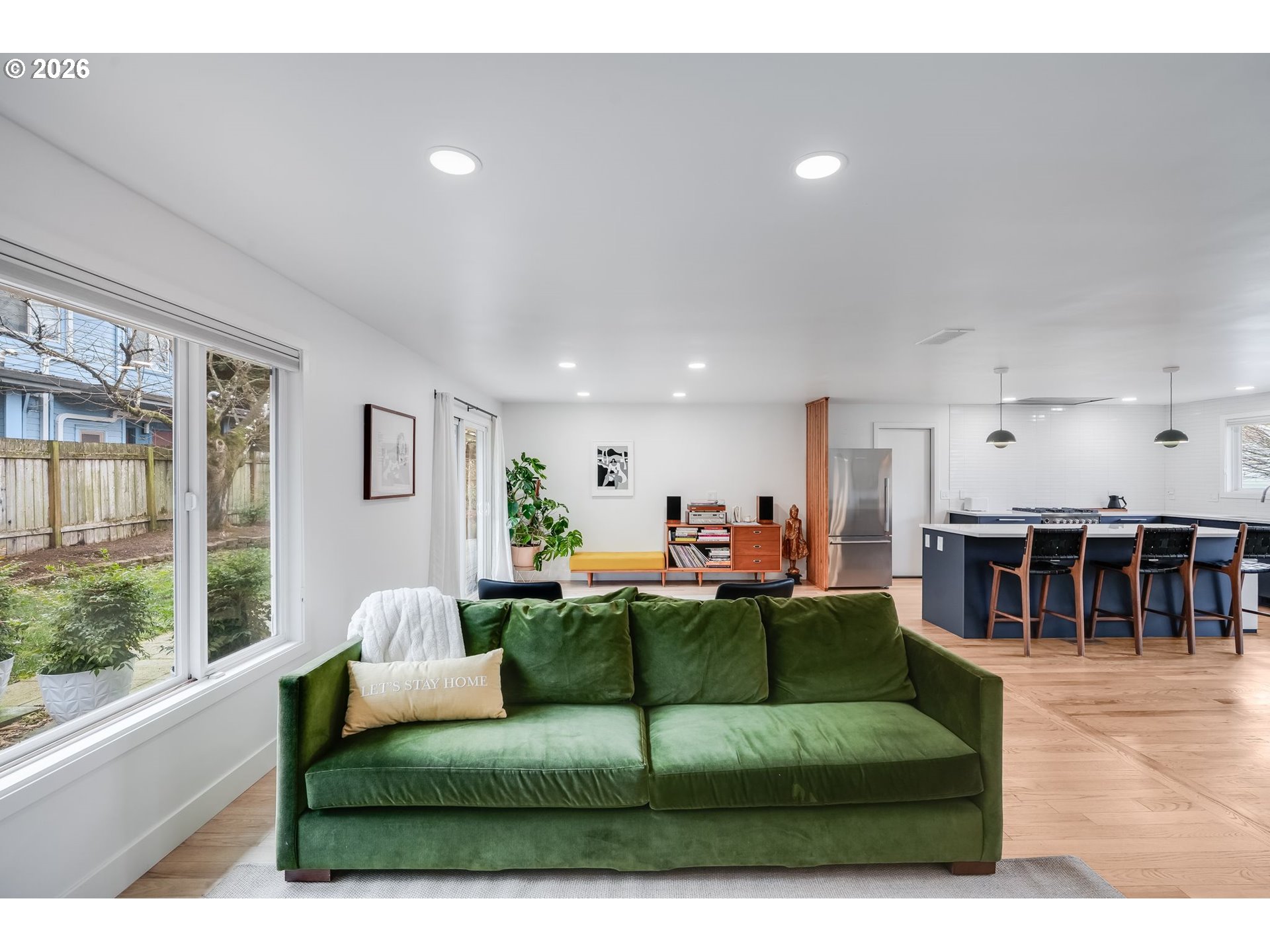 5214 Northeast Jessup Street Portland, OR 97218 - Photo 7 of 28 a living room with furniture and a large window