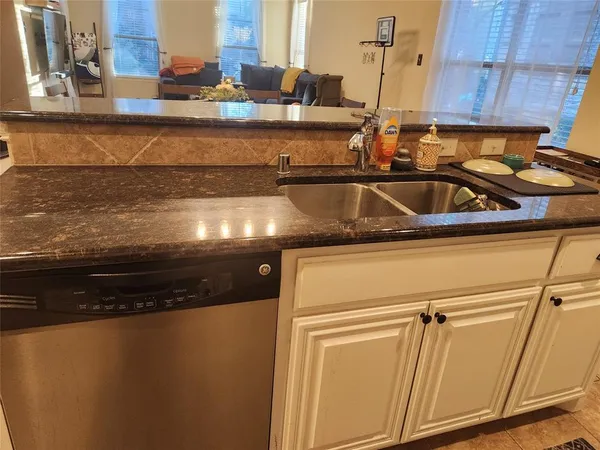 a close view of sink and microwave