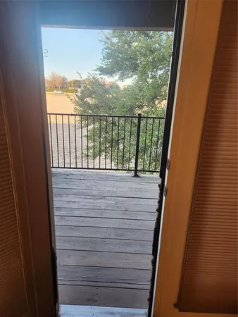 a view of balcony with a garden