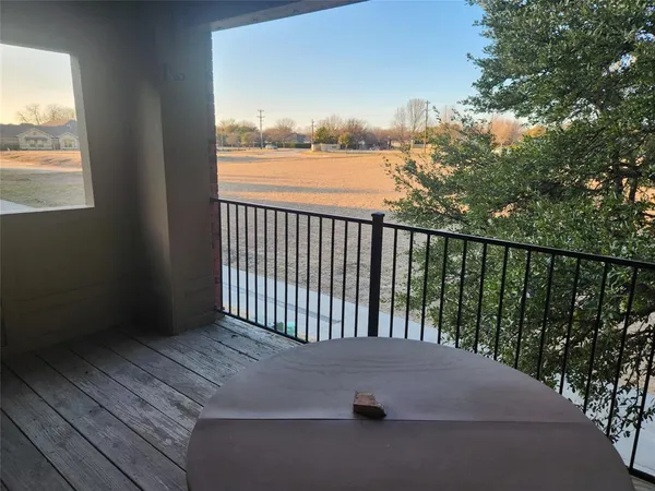 a view of balcony with ocean view