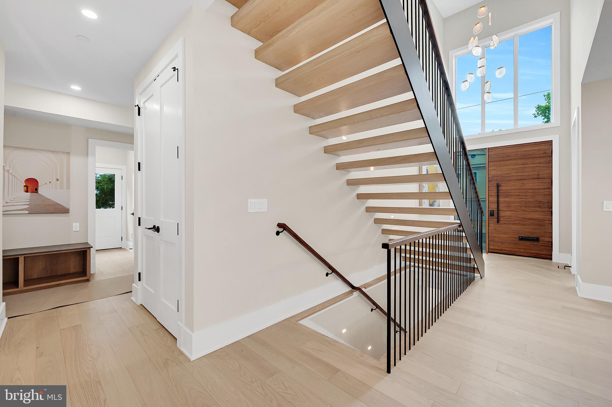 4708 Rosedale Avenue Bethesda, MD 20814 - Photo 12 of 69 Modern entryway with elegant staircase.