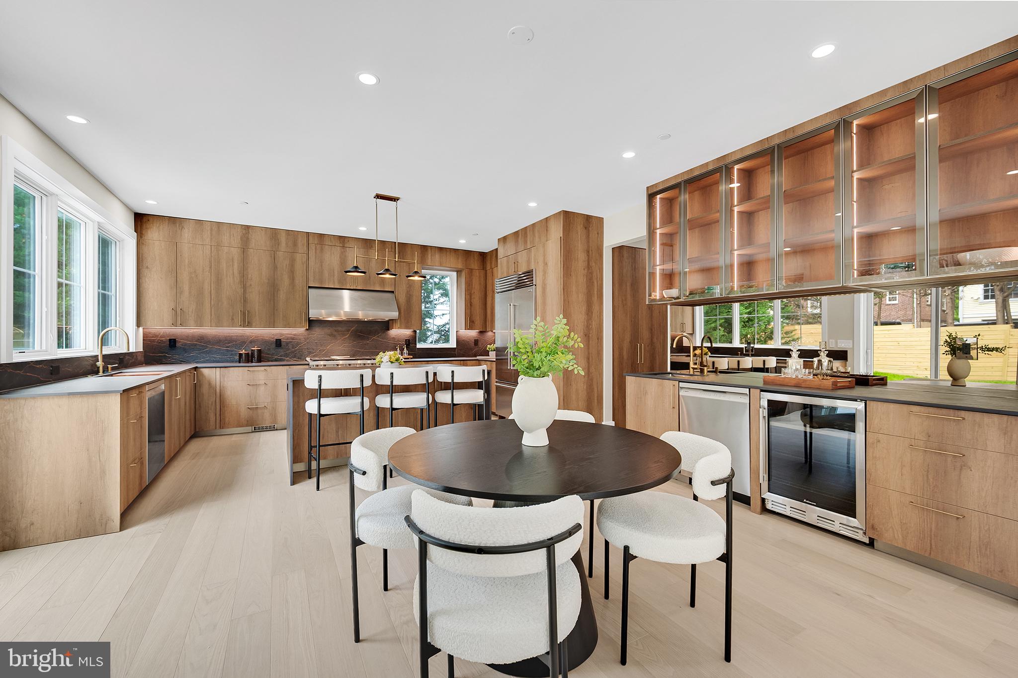 4708 Rosedale Avenue Bethesda, MD 20814 - Photo 20 of 69 Modern kitchen with warm wood accents.