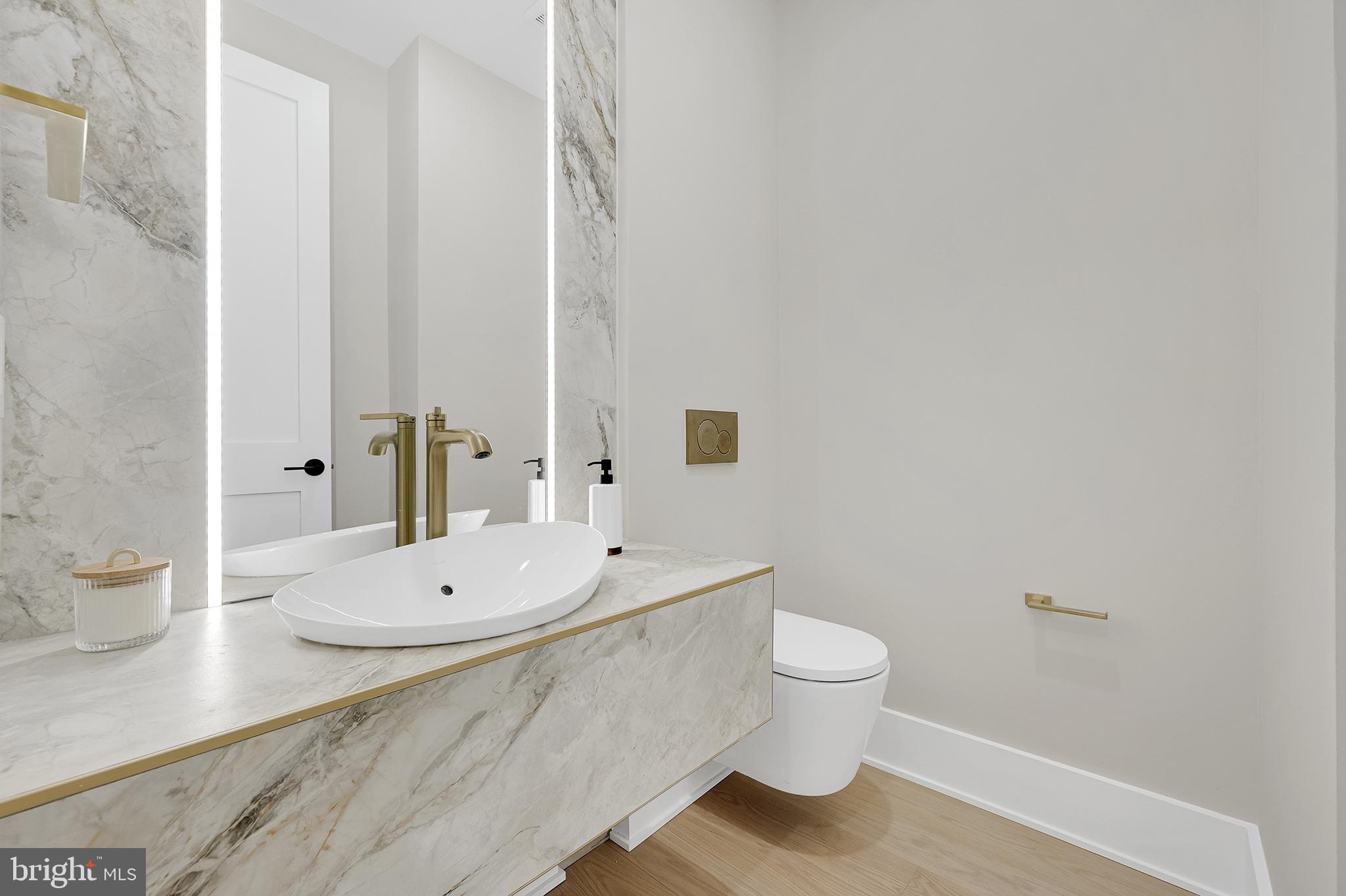 4708 Rosedale Avenue Bethesda, MD 20814 - Photo 27 of 69 Sleek modern bathroom with elegant finishes.