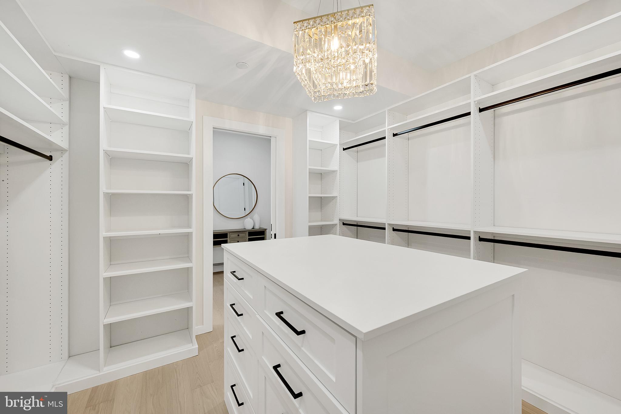 4708 Rosedale Avenue Bethesda, MD 20814 - Photo 33 of 69 Elegant walk-in closet with chic lighting.