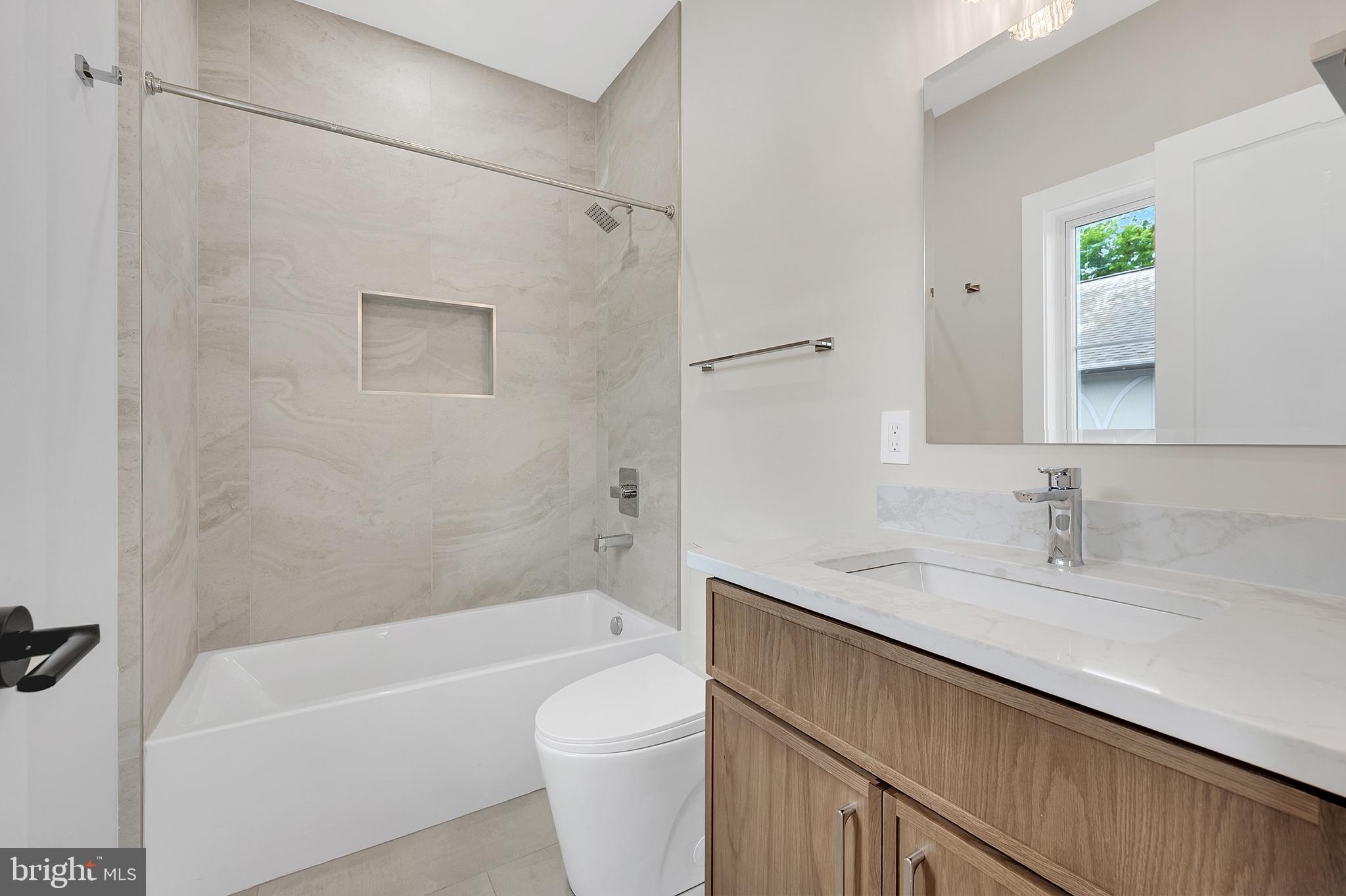 4708 Rosedale Avenue Bethesda, MD 20814 - Photo 39 of 69 Modern bathroom with sleek finishes.