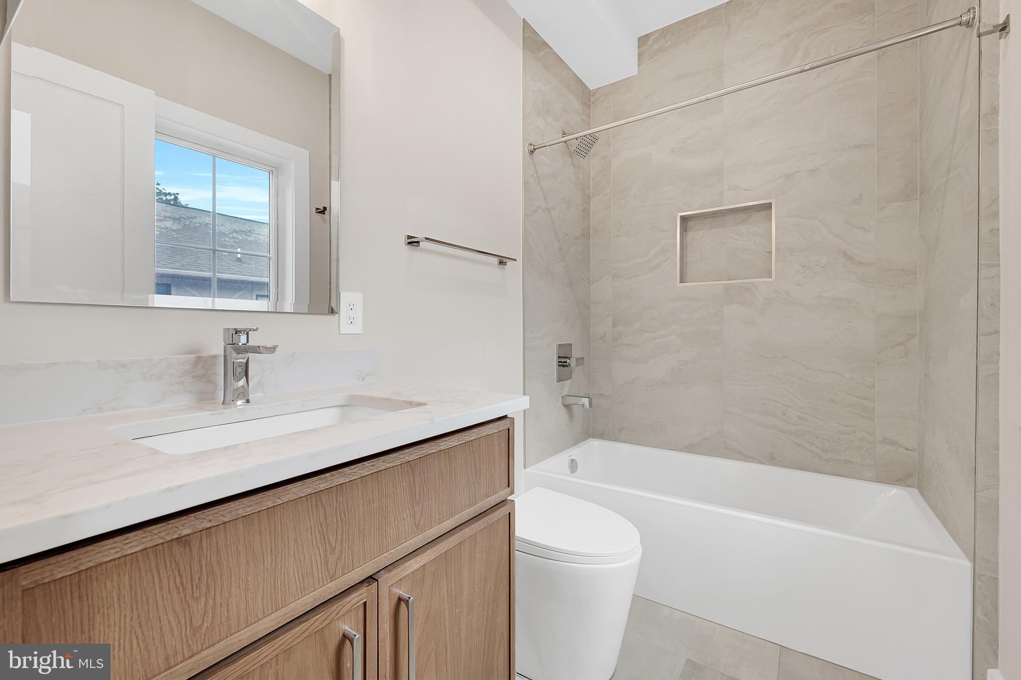 4708 Rosedale Avenue Bethesda, MD 20814 - Photo 44 of 69 Modern elegance in a serene bath.