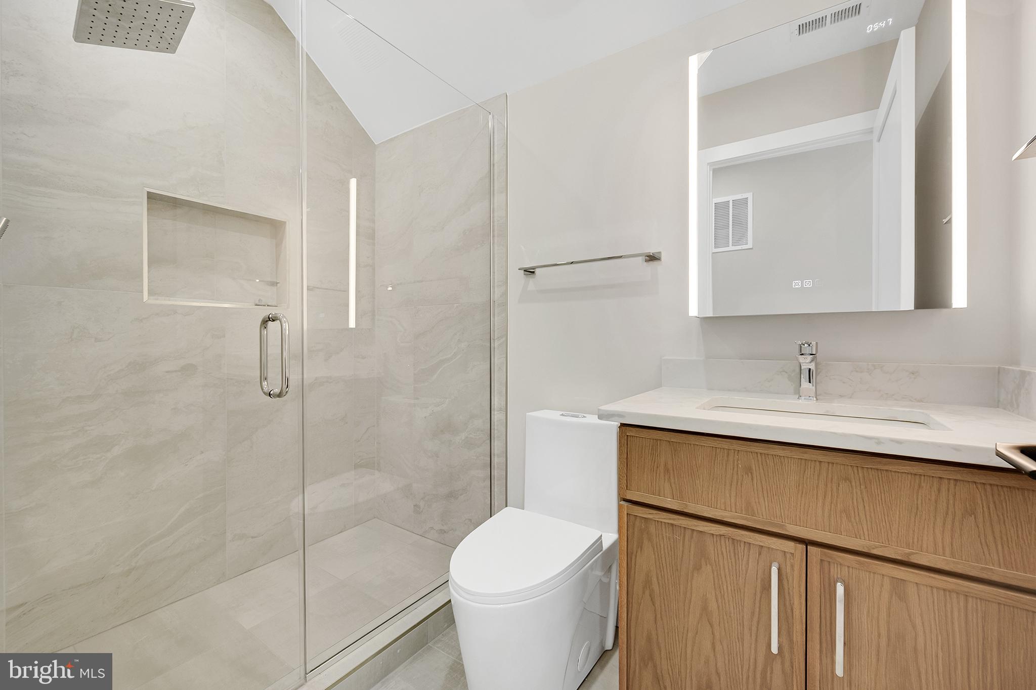 4708 Rosedale Avenue Bethesda, MD 20814 - Photo 53 of 69 Sleek modern bathroom oasis.