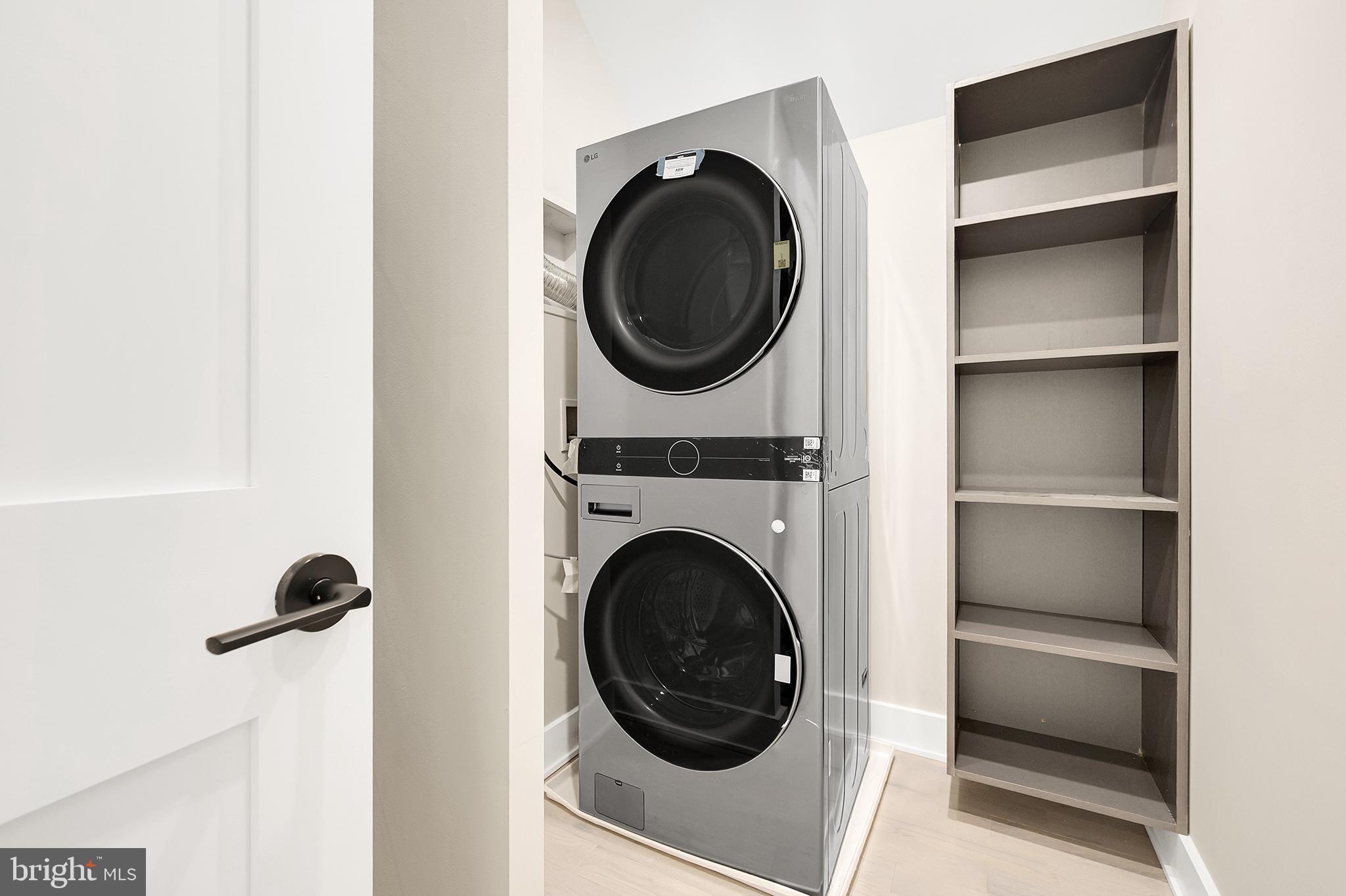 4708 Rosedale Avenue Bethesda, MD 20814 - Photo 54 of 69 Sleek laundry setup in modern space.
