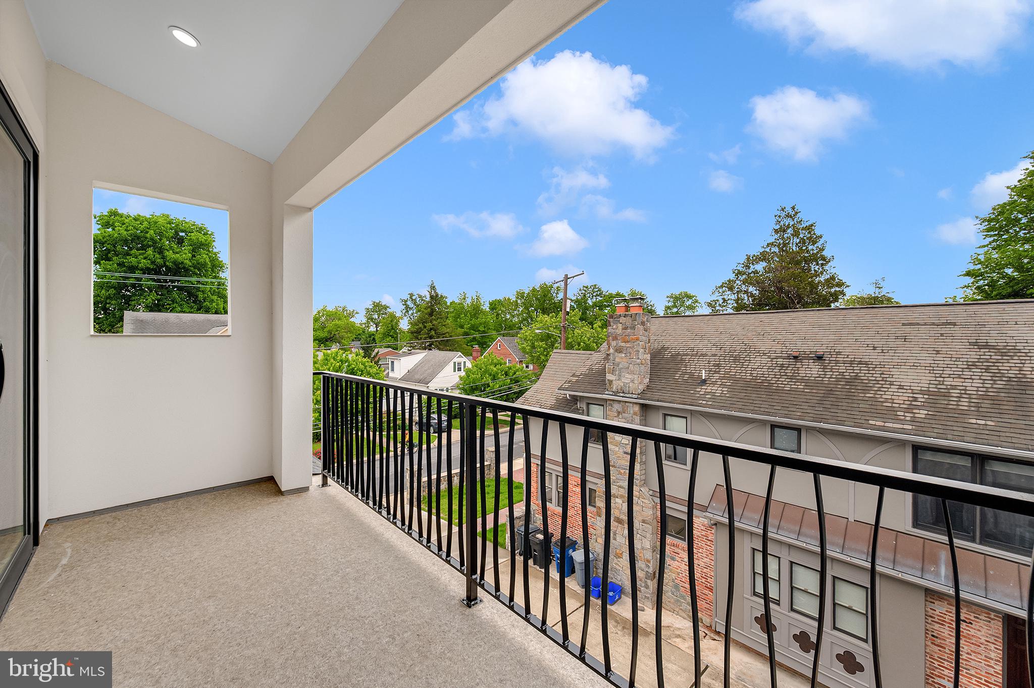 4708 Rosedale Avenue Bethesda, MD 20814 - Photo 58 of 69 Sunny balcony with serene views.