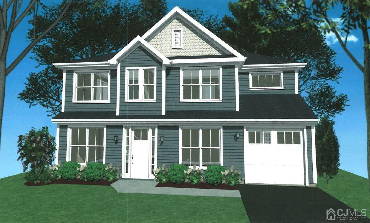 67 Runyon Avenue Edison, NJ 08817 - Photo 1 of 1 a view of a house with a yard and plants