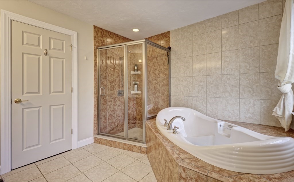 6 Elizabeth Road Auburn, MA 01501 - Photo 20 of 41 a bathroom with a bathtub and shower