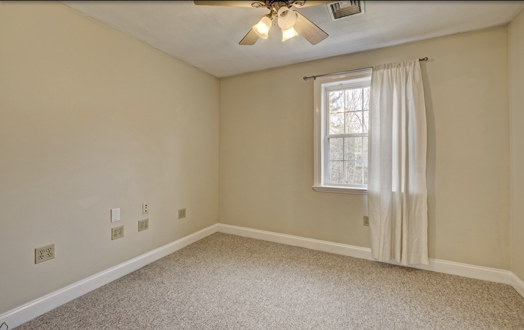 6 Elizabeth Road Auburn, MA 01501 - Photo 21 of 41 an empty room with a window