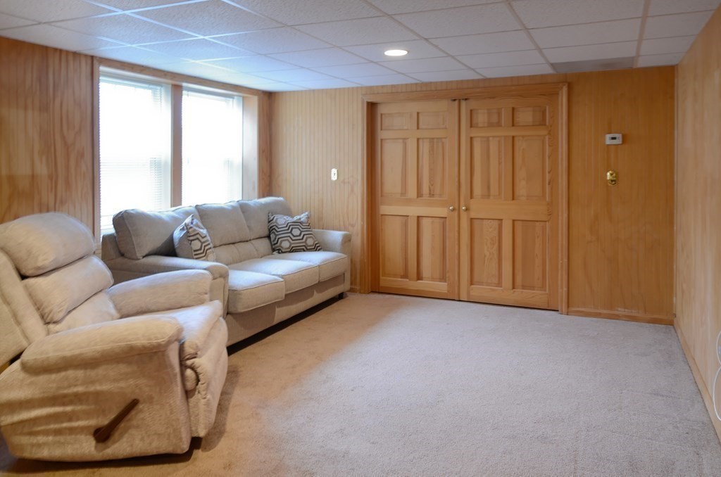 6 Elizabeth Road Auburn, MA 01501 - Photo 26 of 41 a living room with furniture and a window