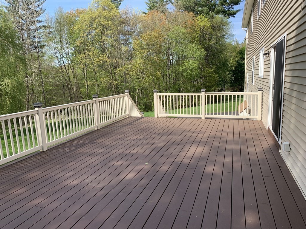 6 Elizabeth Road Auburn, MA 01501 - Photo 32 of 41 a balcony with a hardwood floor