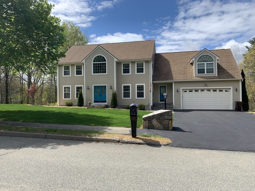 6 Elizabeth Road Auburn, MA 01501 - Photo 34 of 41 a front view of a house with a yard