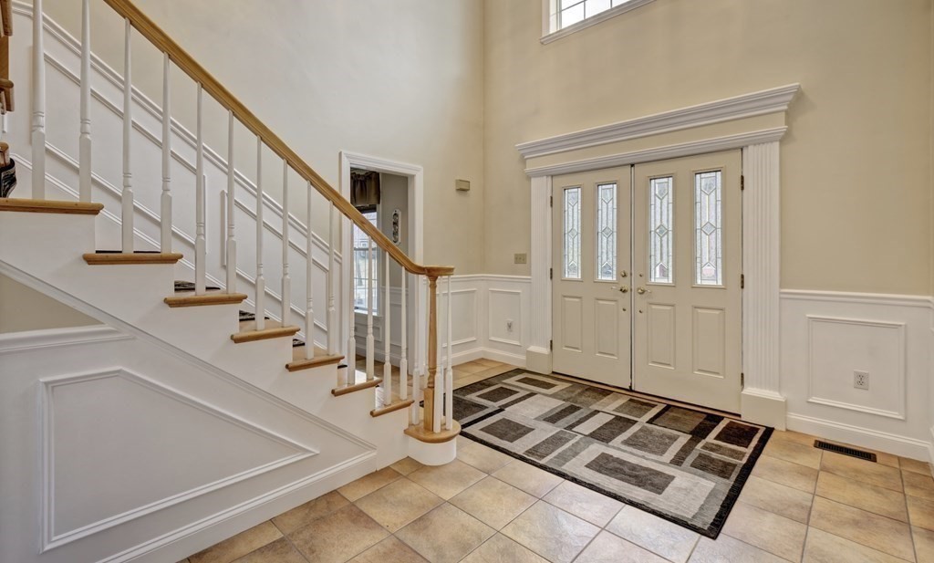 6 Elizabeth Road Auburn, MA 01501 - Photo 6 of 41 a view of an entryway with staircase