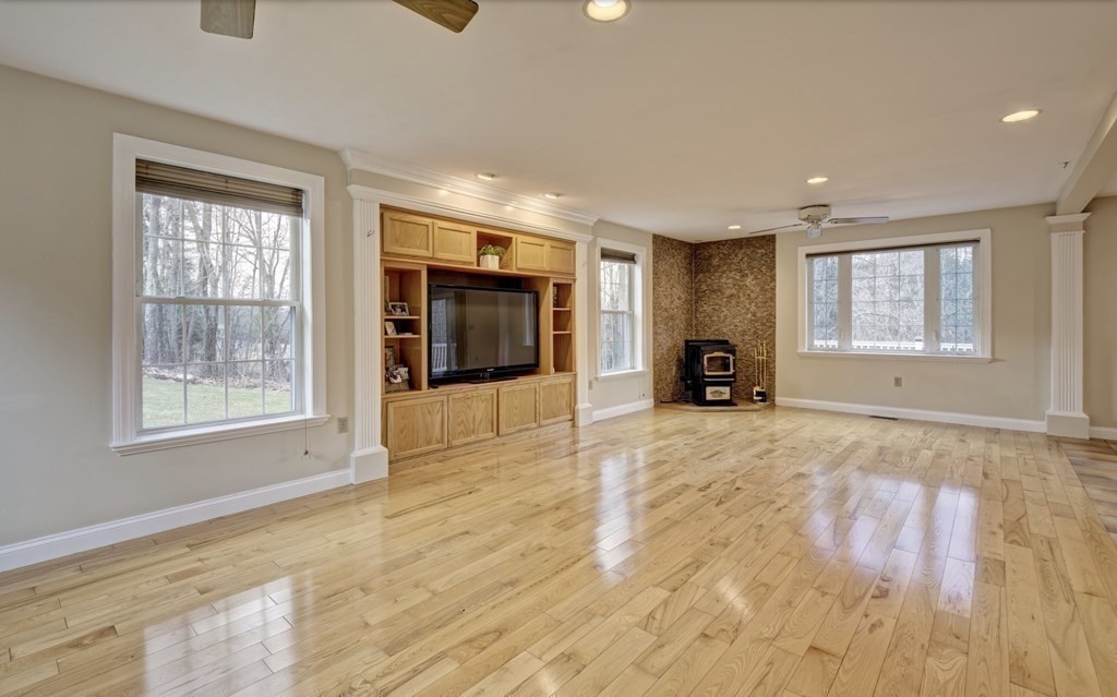 6 Elizabeth Road Auburn, MA 01501 - Photo 7 of 41 a view of empty room with wooden floor and window