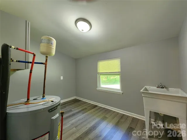 a view of a workspace with furniture