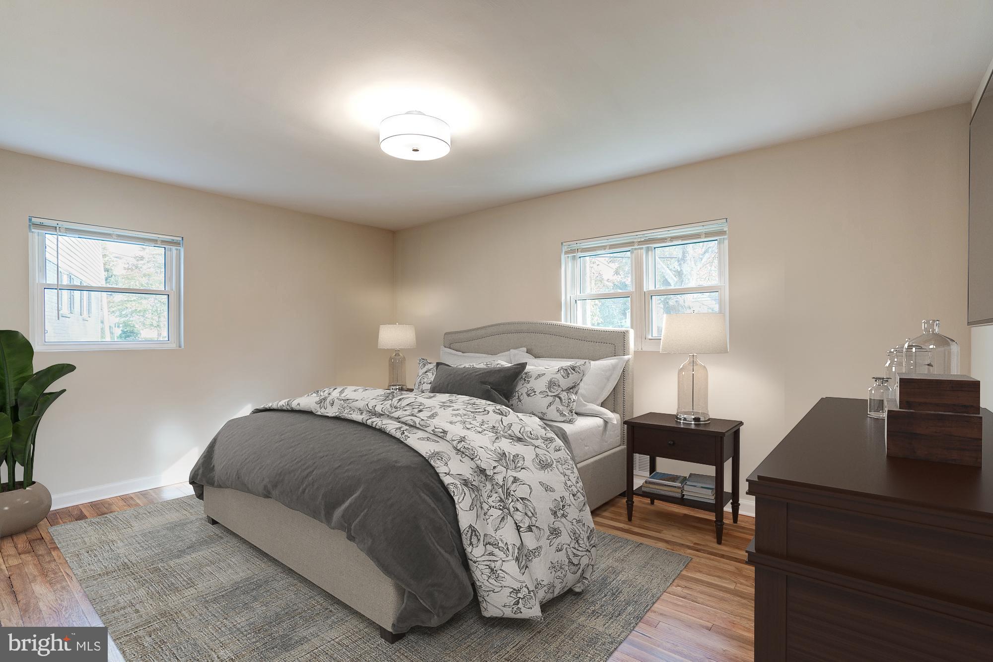 12504 Denley Road Silver Spring, MD 20906 - Photo 11 of 30 Spacious main level bedrm w/front & side exposures
