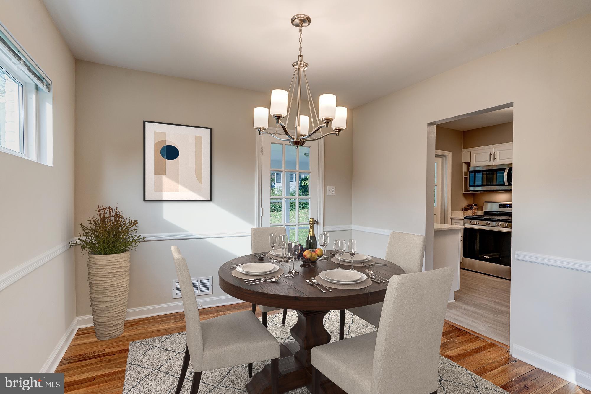 12504 Denley Road Silver Spring, MD 20906 - Photo 5 of 30 Formal dining room with French door exit to porch.