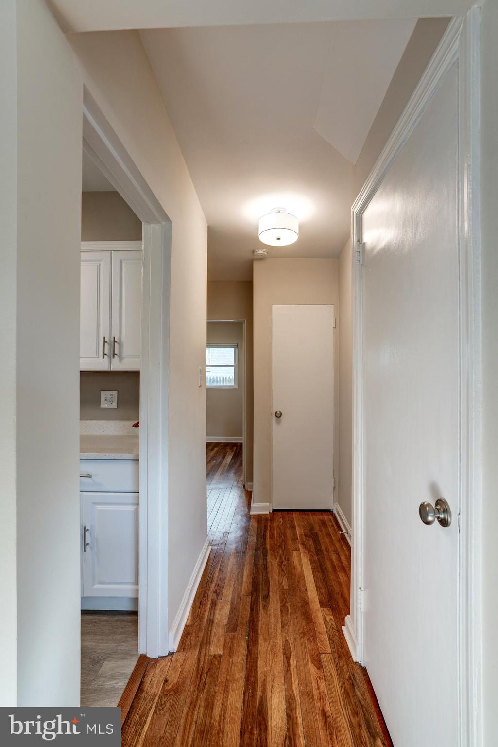 12504 Denley Road Silver Spring, MD 20906 - Photo 6 of 30 Main level hall to kitchen, bedrooms and bath.