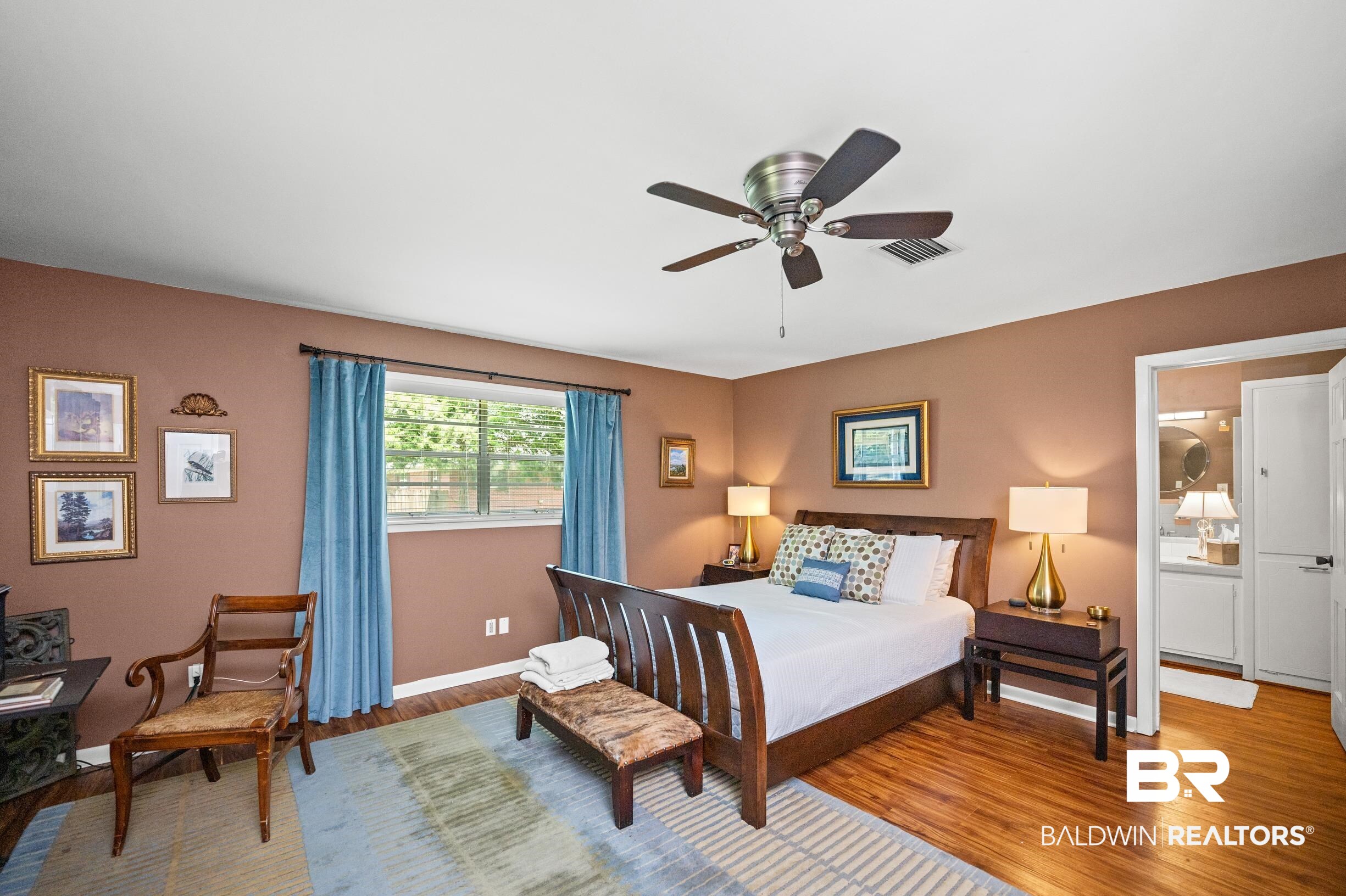 56 Old Bratt Road Atmore, AL 36502 - Photo 20 of 37 Bedroom with wood finished floors, baseboards, and ceiling fan