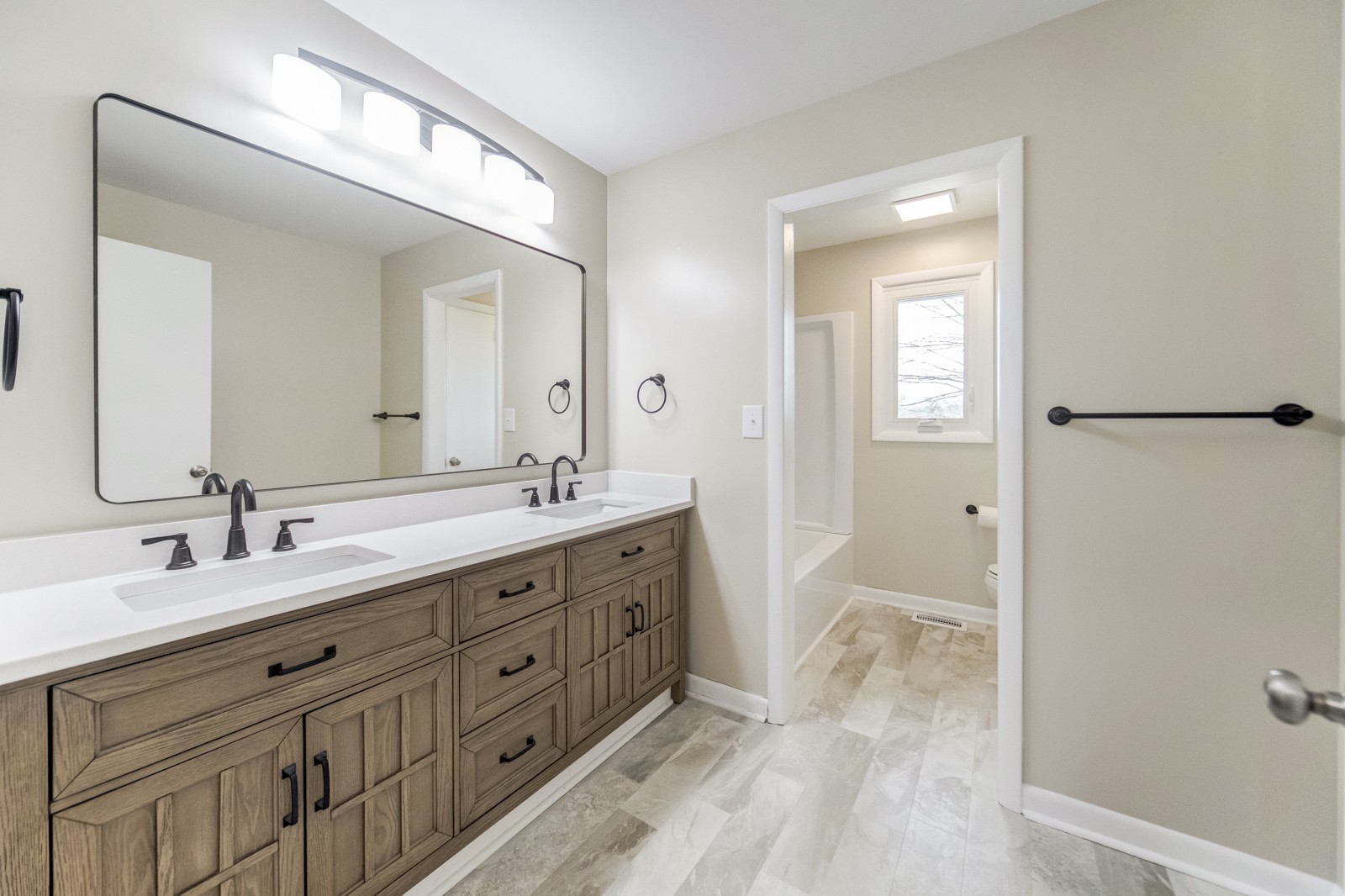 3975 Nonaville Road Mount Juliet, TN 37122 - Photo 23 of 55 a spacious bathroom with a double vanity sink and a mirror