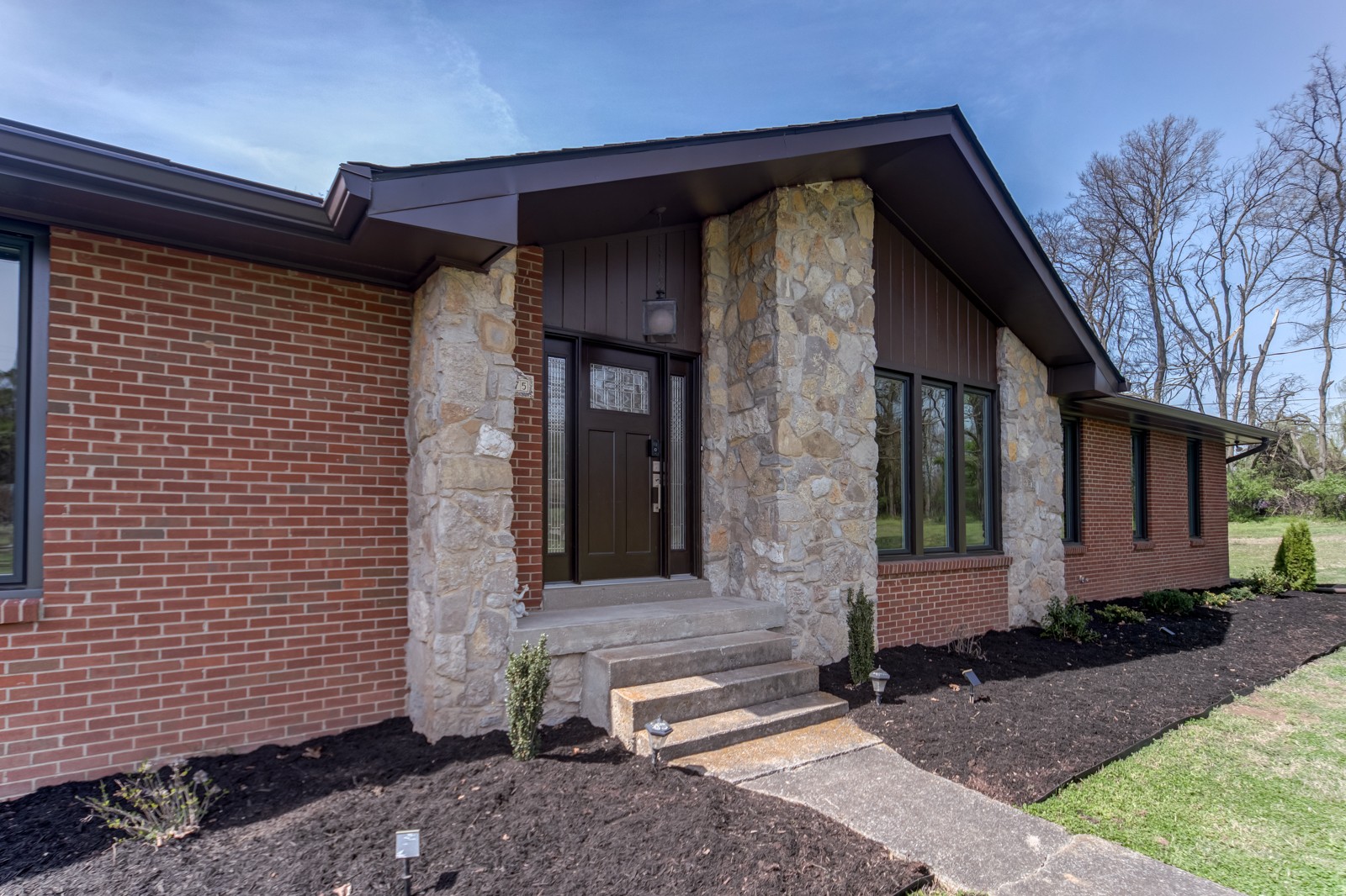 3975 Nonaville Road Mount Juliet, TN 37122 - Photo 7 of 55 a front view of a house with a garden