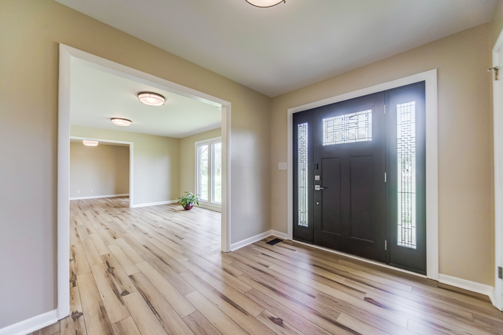 3975 Nonaville Road Mount Juliet, TN 37122 - Photo 8 of 55 an empty room with wooden floor and entrance
