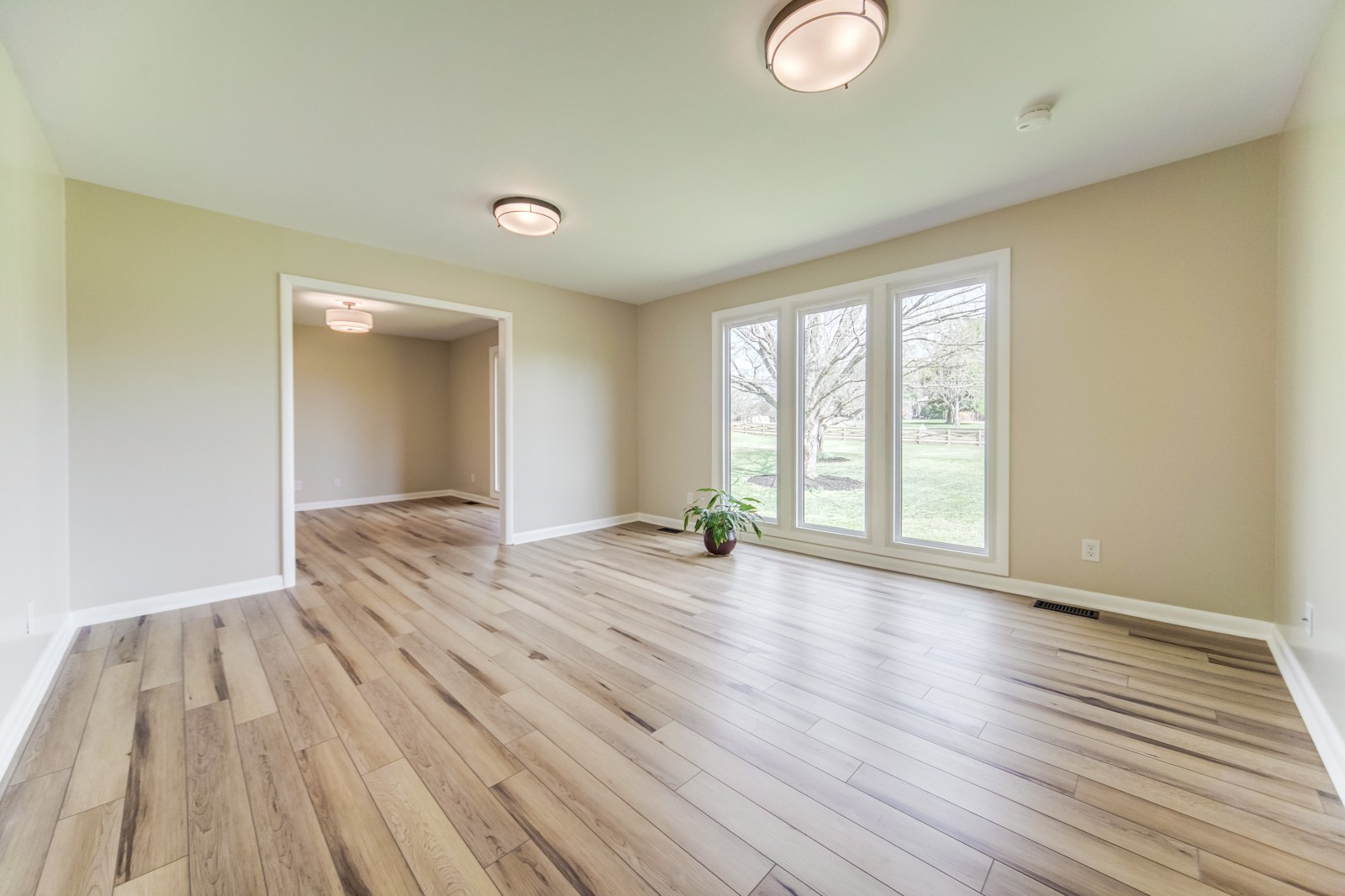 3975 Nonaville Road Mount Juliet, TN 37122 - Photo 10 of 55 an empty room with wooden floor and windows