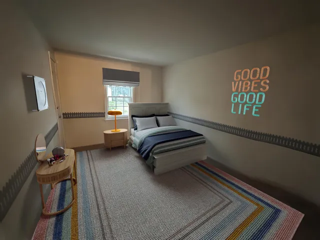 a bedroom with a bed and a couch