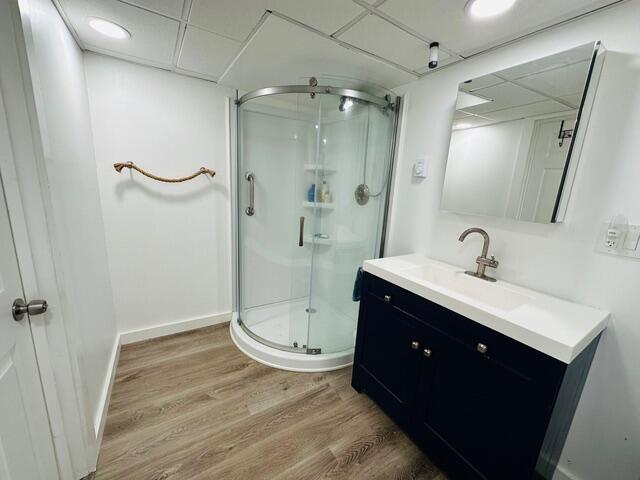 8 Jasmine Lane Hyannis, MA 02601 - Photo 19 of 28 a spacious bathroom with a double vanity sink toilet mirror and shower
