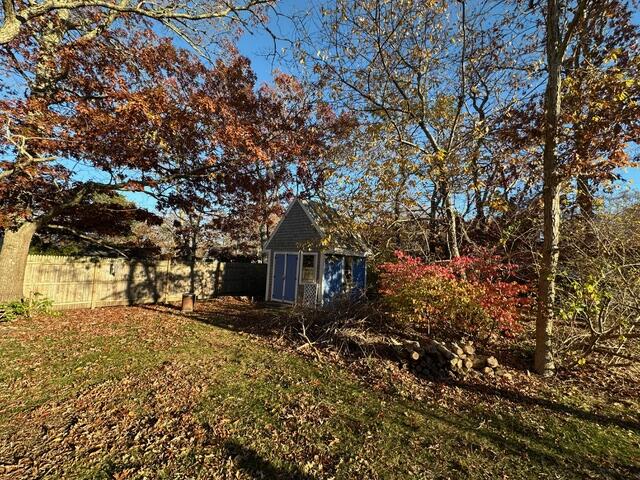 8 Jasmine Lane Hyannis, MA 02601 - Photo 21 of 28 a large tree in front of a house