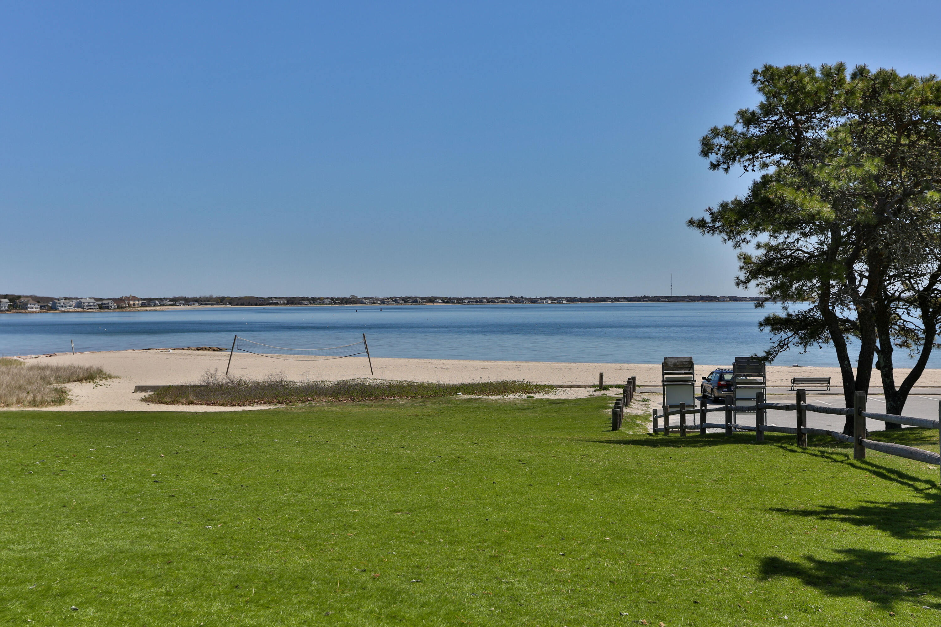 8 Jasmine Lane Hyannis, MA 02601 - Photo 24 of 28 a view of a swimming pool with lawn chairs and a big yard