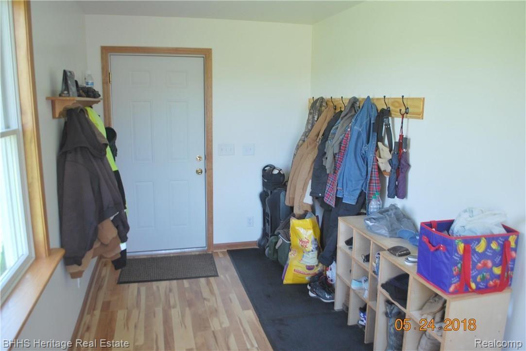 3300 Cemetery Road Fowlerville, MI 48836 - Photo 29 of 41 Mud room and entrance to garage