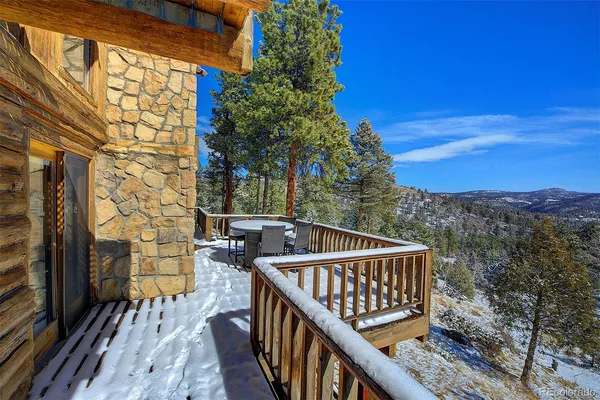a view of balcony with furniture