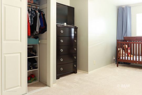 240 West Sequoia Place Ridgecrest, CA 93555 - Photo 18 of 32 a view of walk in closet with clothes and shoes