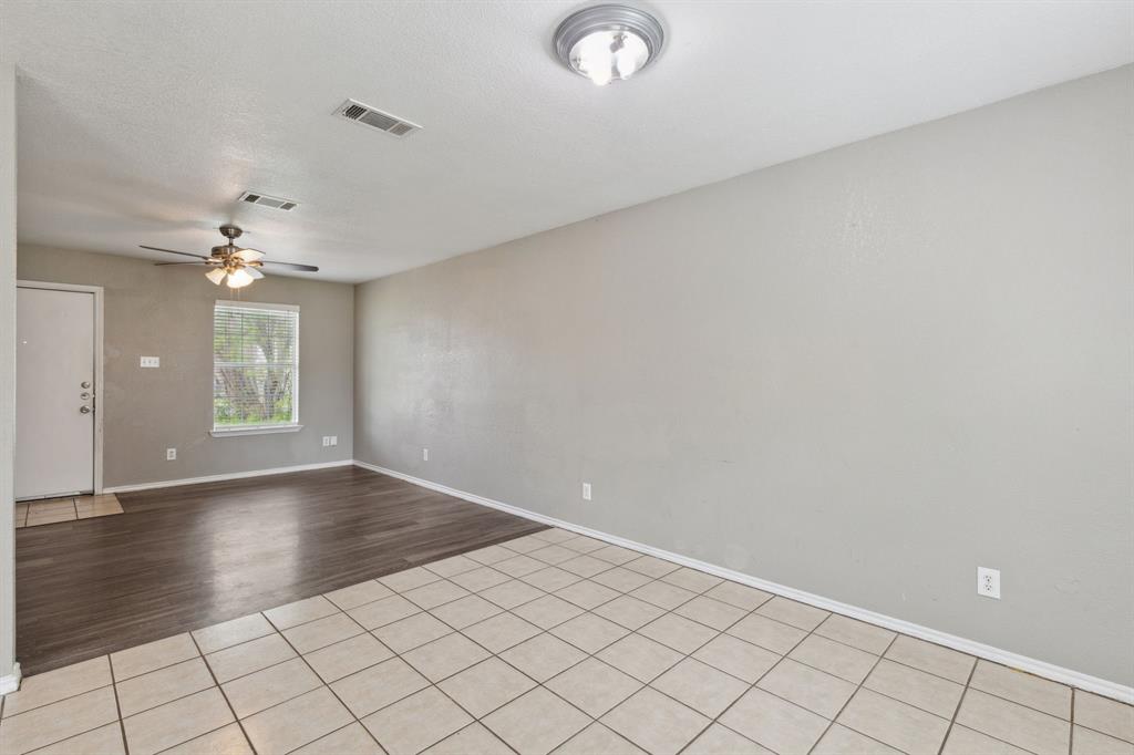 806 East College Street Terrell, TX 75160 - Photo 8 of 29 wooden floor in an empty room