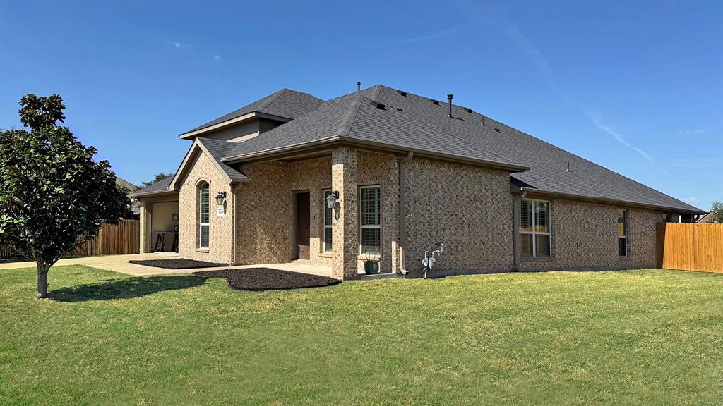1113 Seguin Road Forney, TX 75126 - Photo 2 of 32 a front view of a house with a yard